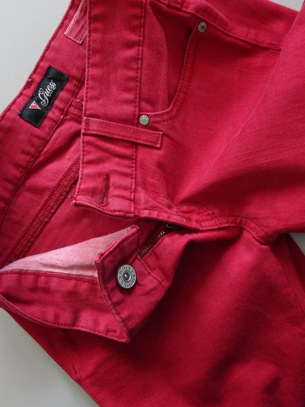 Guess women's or girl's jeans size 27 color red unsewn hem